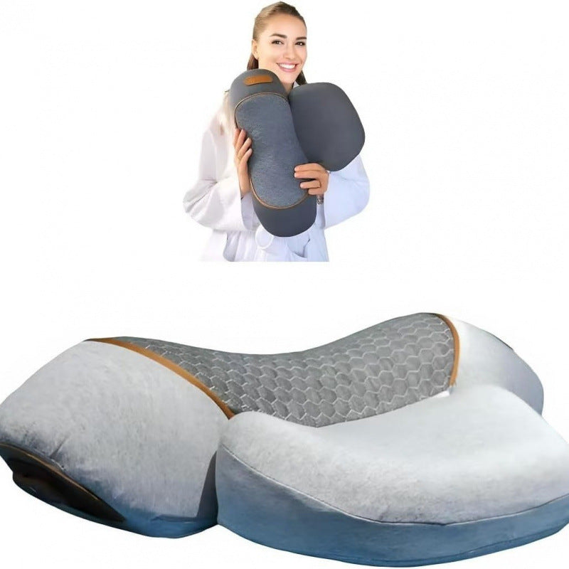 Light Grey electric neck massager held to show its size, with a close-up of the memory foam cradle