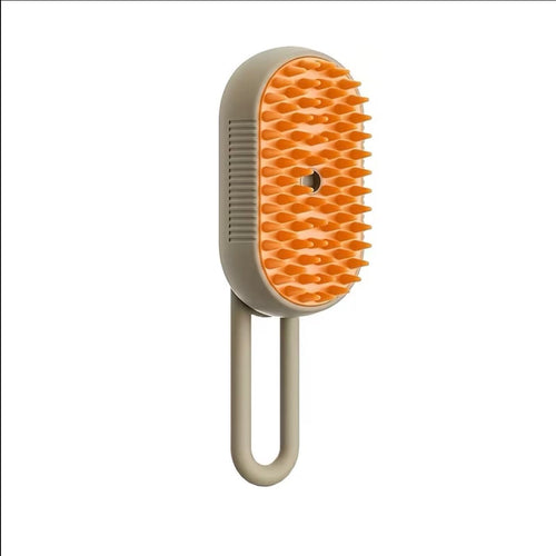 The brush on a plain background, showing the silicone teeth and looped handle